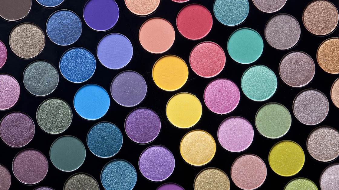 A brightly coloured palette of eye shadows A brightly coloured palette of eye shadows