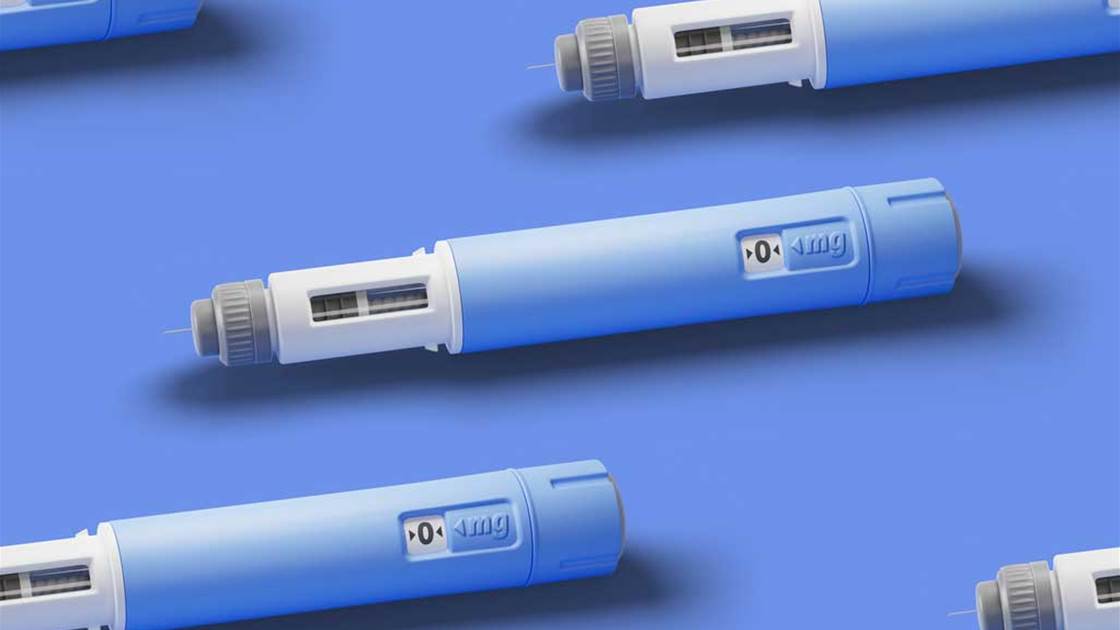 Weight loss drug injectors on a blue background. Weight loss drug injectors on a blue background.