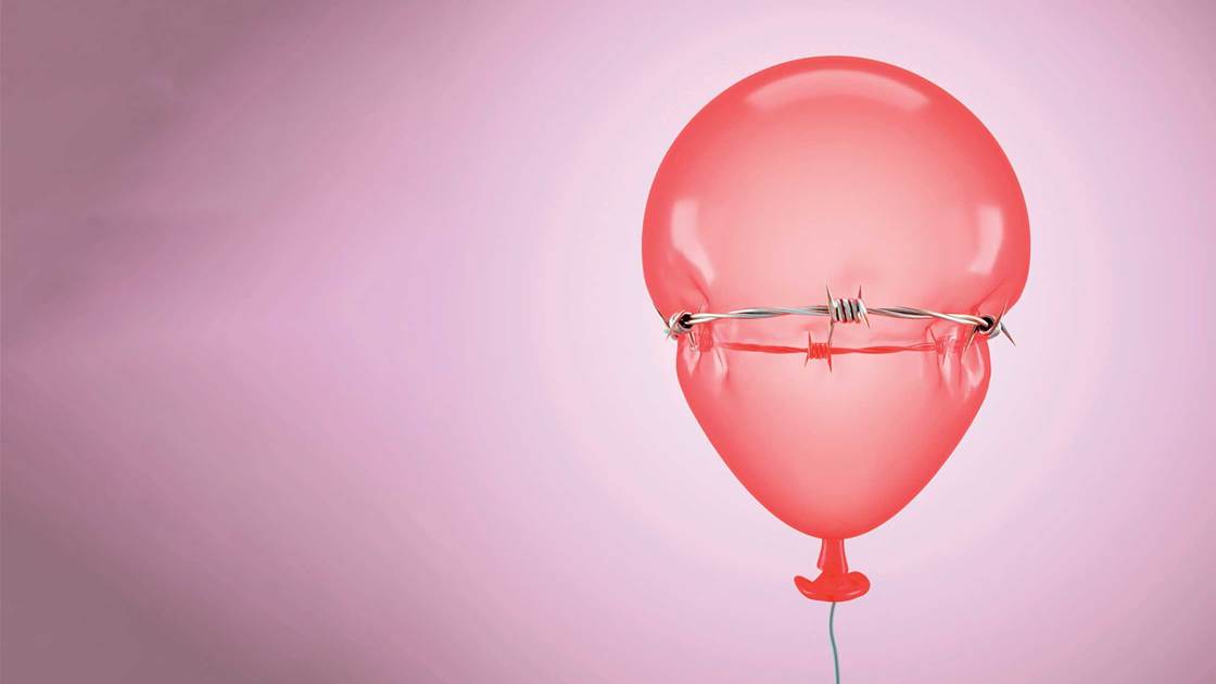 A balloon surrounded by barbed wire, indicating the pain of a urinary tract infection A balloon surrounded by barbed wire, indicating the pain of a urinary tract infection