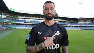 Socceroos gloveman swaps Greek tragedy for Danish delight