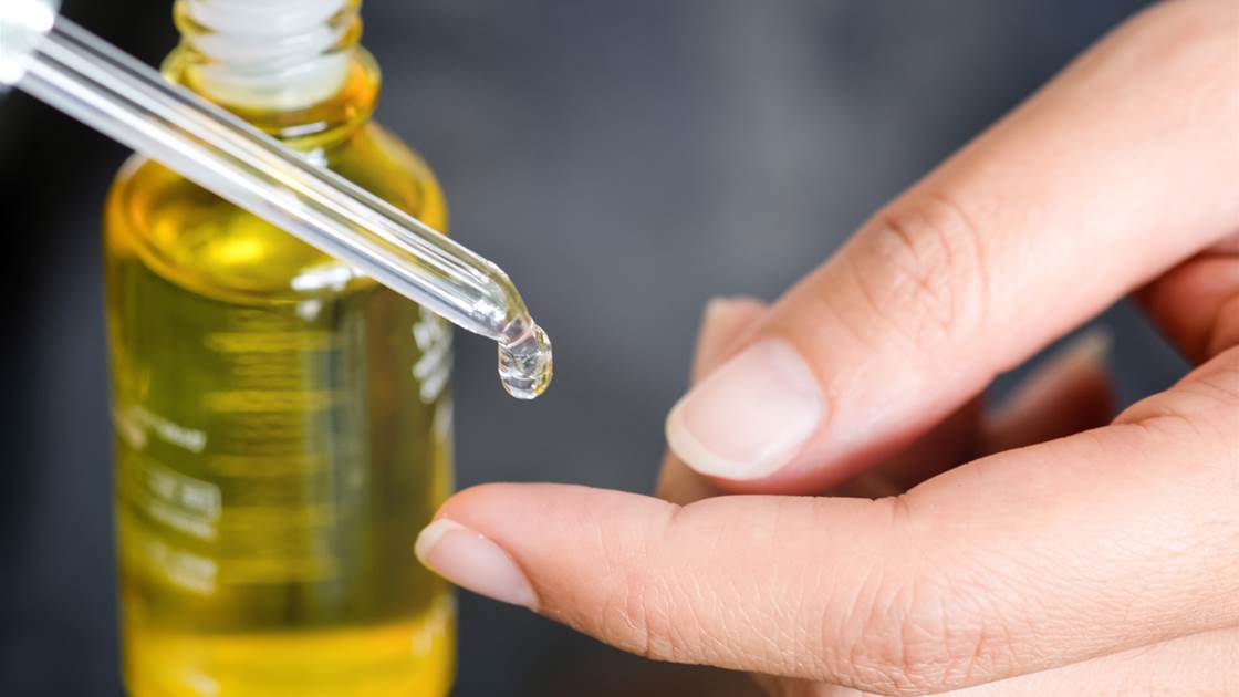 Vitamin E oil dropper with skincare benefits for healthy, glowing skin Vitamin E oil dropper with skincare benefits for healthy, glowing skin