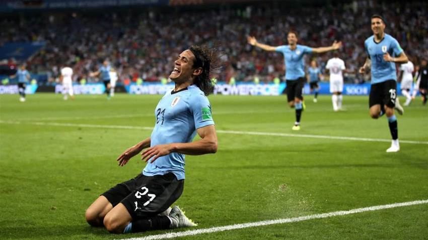 Uruguay beat Portugal after Cavani double Uruguay beat Portugal after Cavani double