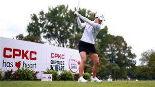 Aussie golfer soars with eagles to share lead in Canada