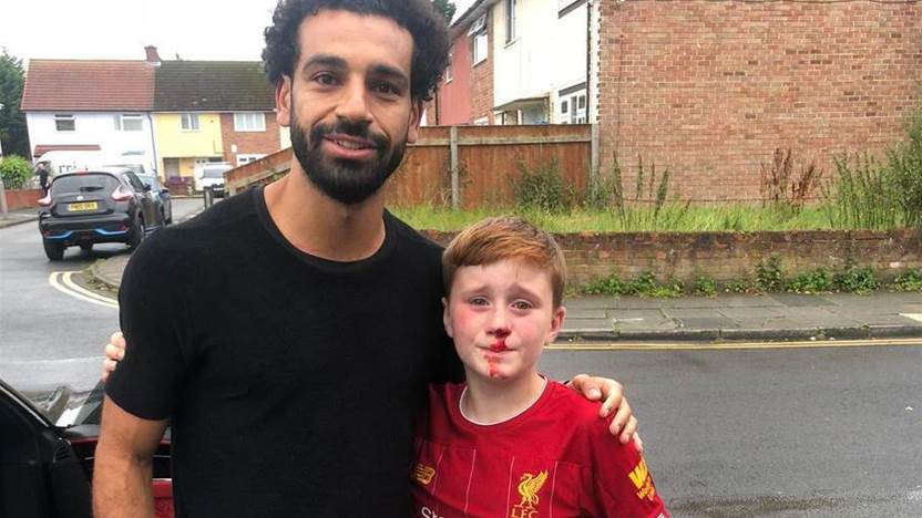 Mo Salah visits young fan who knocked himself out in pursuit of the Egyptian