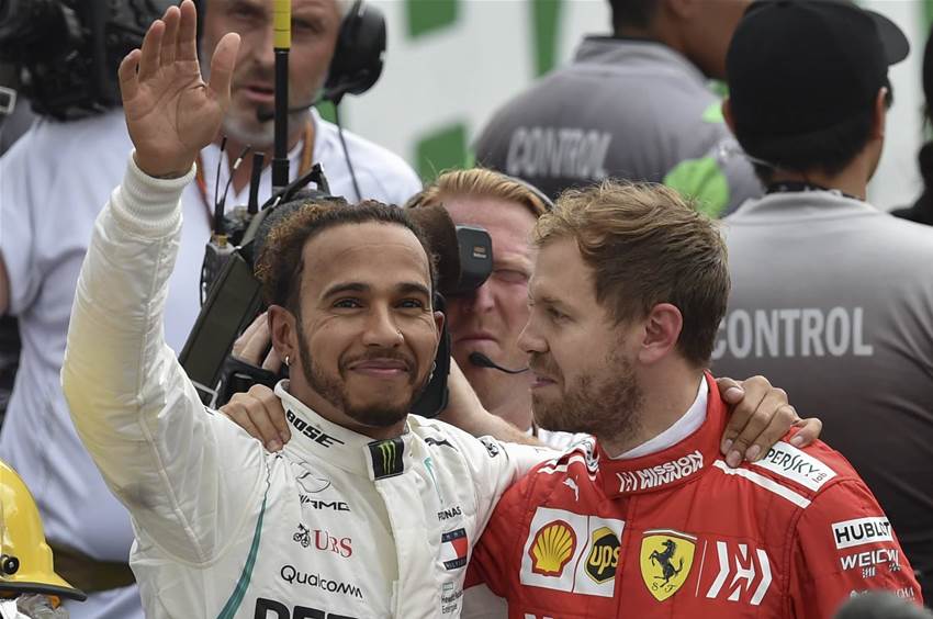 Hamilton clinches fifth world crown after 'horrible' race Hamilton clinches fifth world crown after 'horrible' race