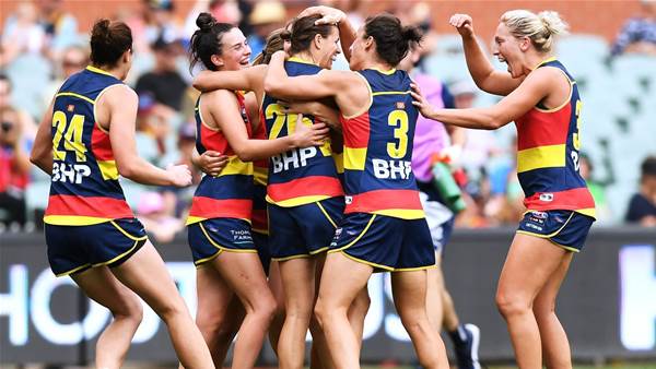 Crows win big to book home grand final