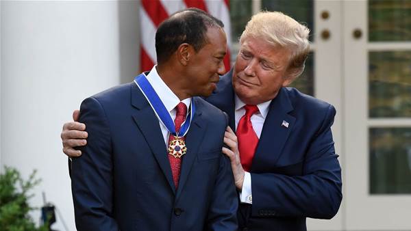 Trump awards 'true legend' Tiger Woods
