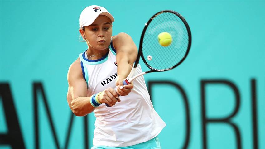 Barty charges on in Madrid