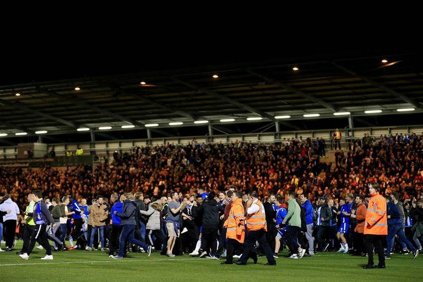 Watch! Colchester supporters storm field after historic win over Spurs