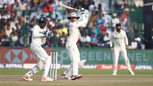 Khawaja and Handscomb lead Australia to a solid 263