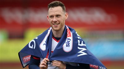 'Outstanding' Aussie wins League One promotion, signs new deal