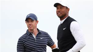 Rory, Tiger happy with Norman's Open snub