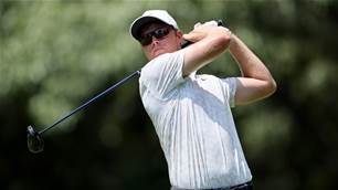 Davis clings on to advance in playoffs with Day, Scott