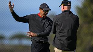 Down but not out: Tiger has seventh back surgery