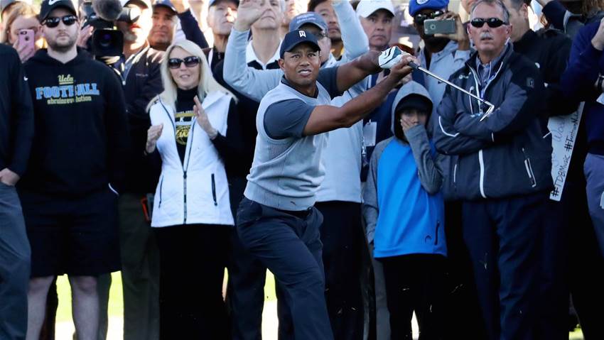 Woods braves early storm at Riviera Woods braves early storm at Riviera