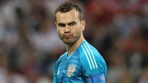 Goalkeeper Akinfeev given bouquet of tomatoes during Russia team meeting with fans