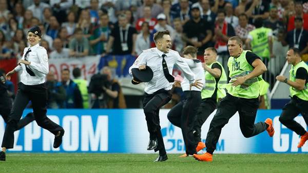 Four people to run onto pitch during World Cup final receive 15 days in detention