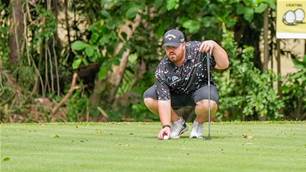 Lamb flirts with record to share PNG Open lead