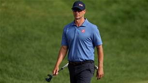 Scott runs hot to sit second at Travelers