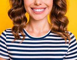 How to Get Rid of Smile Lines, According to Dermatologists