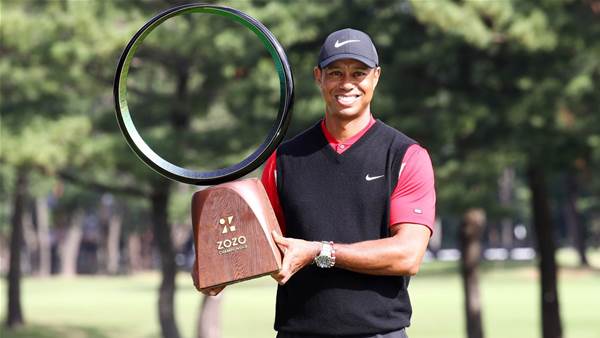 Woods wins record-tying 82nd PGA Tour title