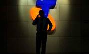 Telstra wants to hang onto business services a bit longer