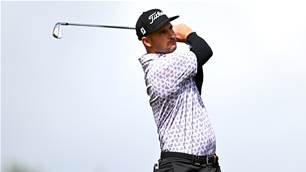 Wood pulls clear in PNG as rain makes way for downpour of birdies