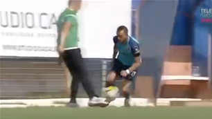 WATCH: Coach sent off for tripping rival player