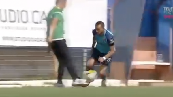 WATCH: Coach sent off for tripping rival player