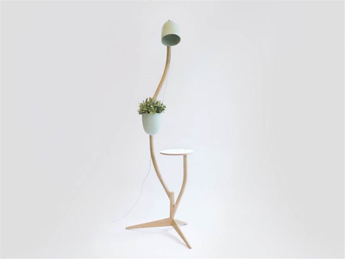 a lamp, table and flowerpot in one a lamp, table and flowerpot in one