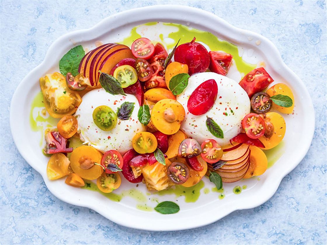 burrata with tomatoes and mint-basil oil burrata with tomatoes and mint-basil oil