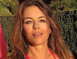 Elizabeth Hurley, 56, Shows off Toned Abs While Wearing a Bright Pink Bikini in New Instagram Post