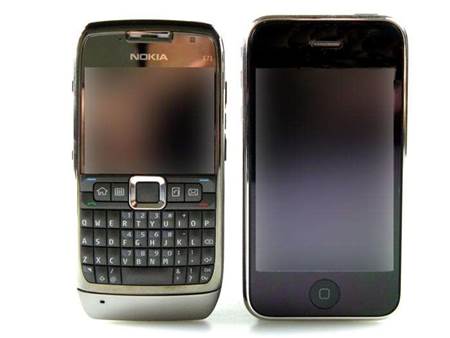The Nokia E71 on left, side by side with the iPhone 3G on the right.