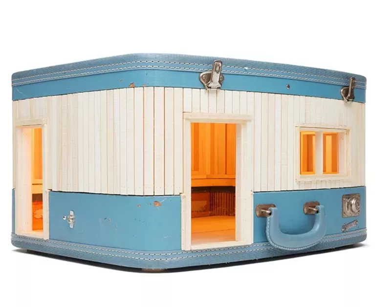 ted lott redesigns vintage suitcase into miniature abodes