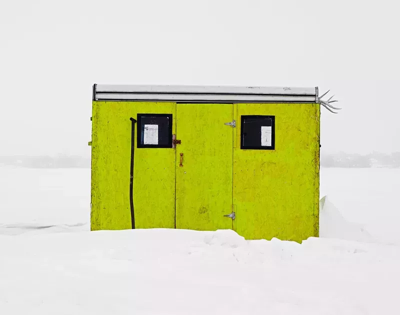 richard johnson snaps colourful ice huts in the canadian wilderness