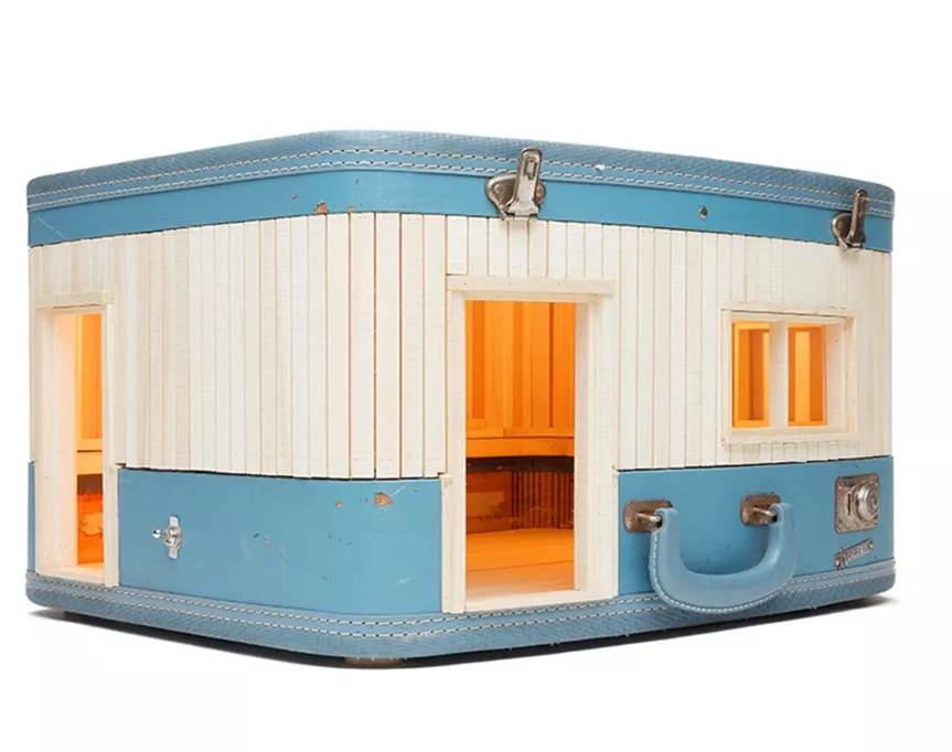 ted lott redesigns vintage suitcase into miniature abodes