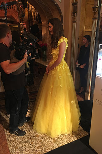 A model is dressed as Belle