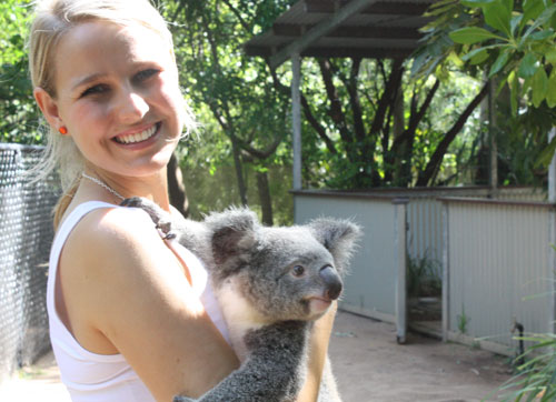 Candice cuddles a koala