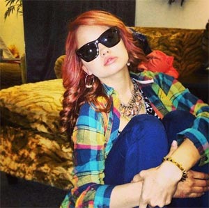Debby's colourful fashion sense! Photo: Facebook