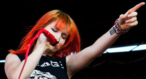 Paramore's lead singer Hayley's hair is pink and orange!